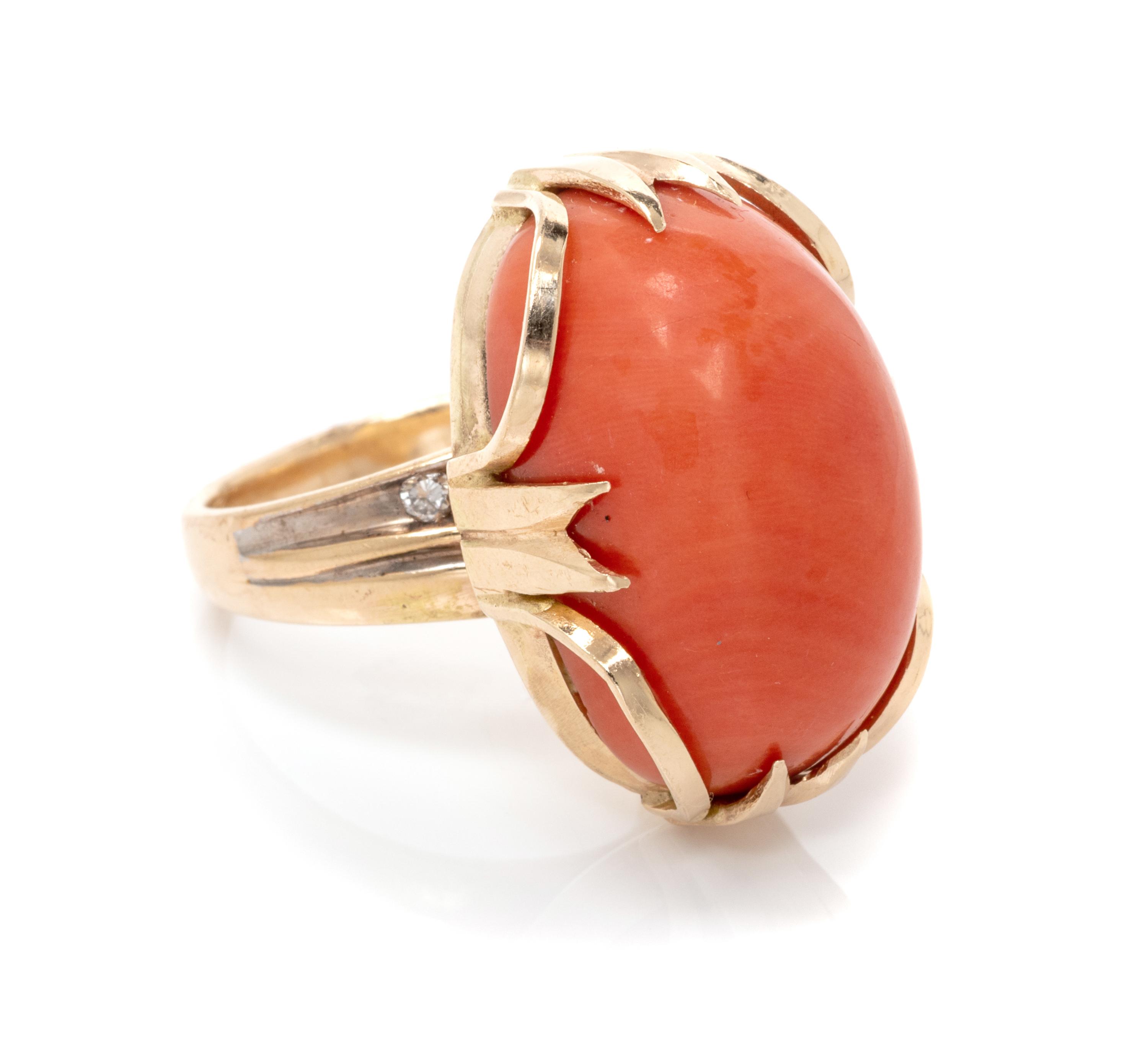 A 14 Karat Yellow Gold, Coral, and Diamond Ring, 16.80 dwts.