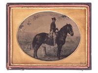[CIVIL WAR]. Quarter plate tintype of a Federal cavalry soldier on horseback.