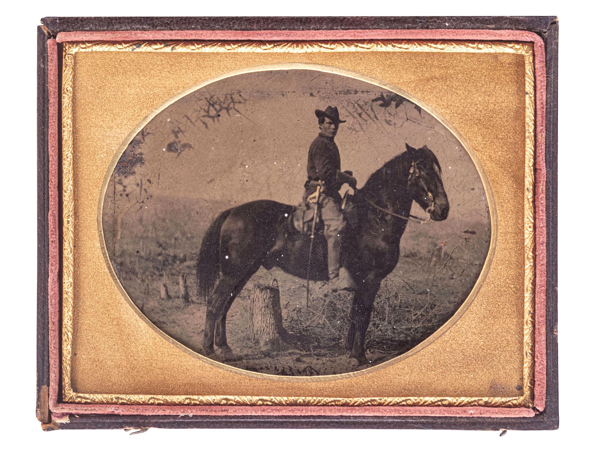 [CIVIL WAR]. Quarter plate tintype of a Federal cavalry soldier on horseback.