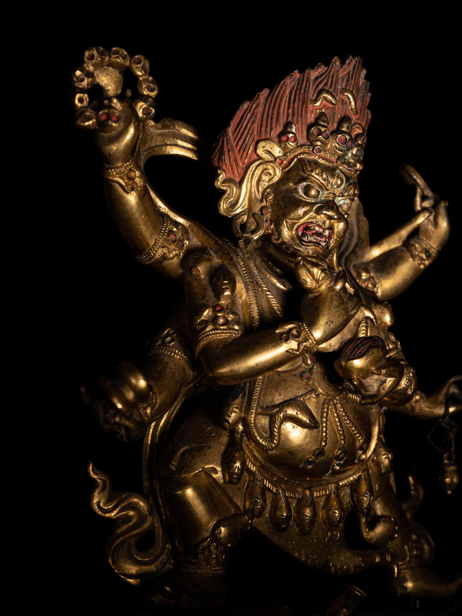 A Sino-Tibetan Gilt Bronze Figure of Mahakala
