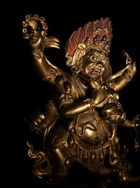 A Sino-Tibetan Gilt Bronze Figure of Mahakala