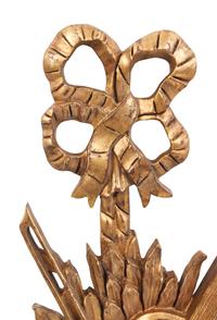 A Set of Four Giltwood Wall Trophies