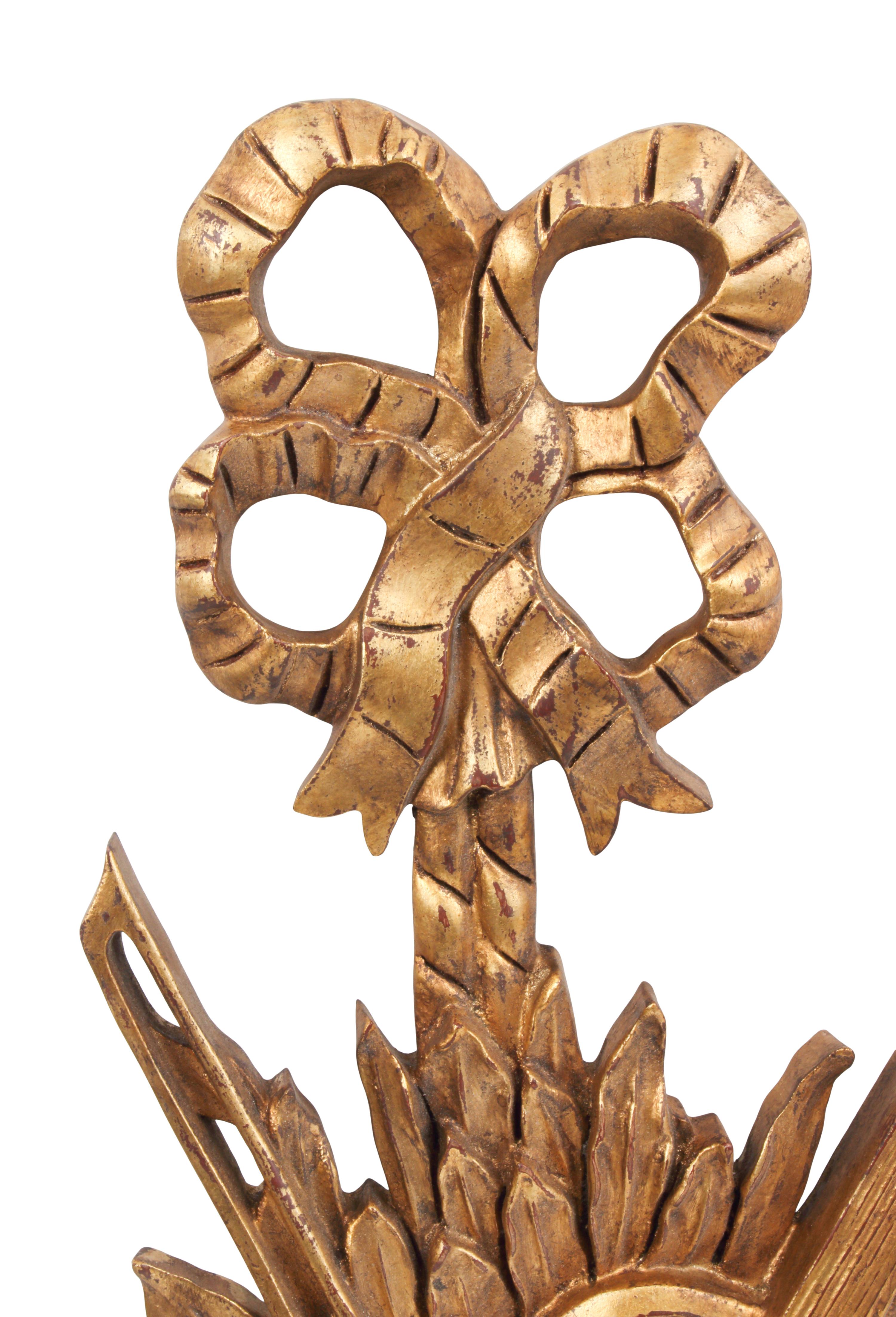 A Set of Four Giltwood Wall Trophies