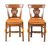 A Pair of Directoire Carved Walnut Rush-Seat Side Chairs