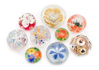 A Collection of Glass Paperweights Diameter of largest 3 1/2 inches