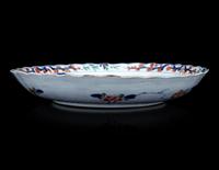 A Pair of Chinese Export Imari and Famille Rose Porcelain Covered Jars and a Flori-Form Plate