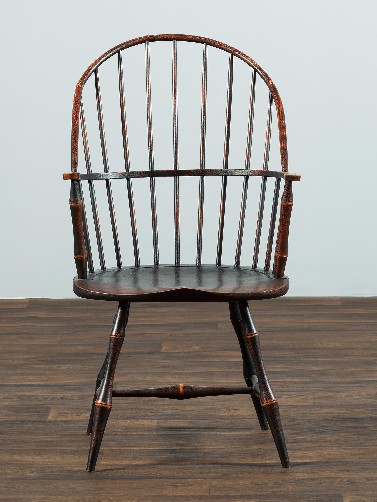 A David T. Smith Black Painted Sack-Back Windsor Armchair
