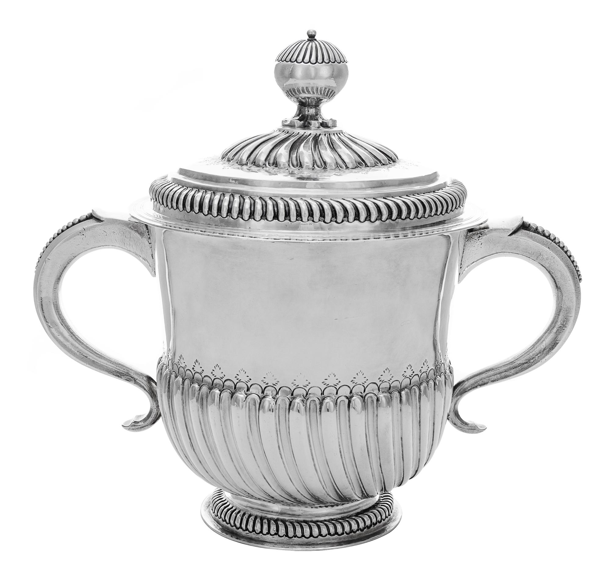 A William III Silver Two-Handled Cup and Cover, John Smith, London, 1699, of spiral fluted cylindrical form, engraved with stylized fol