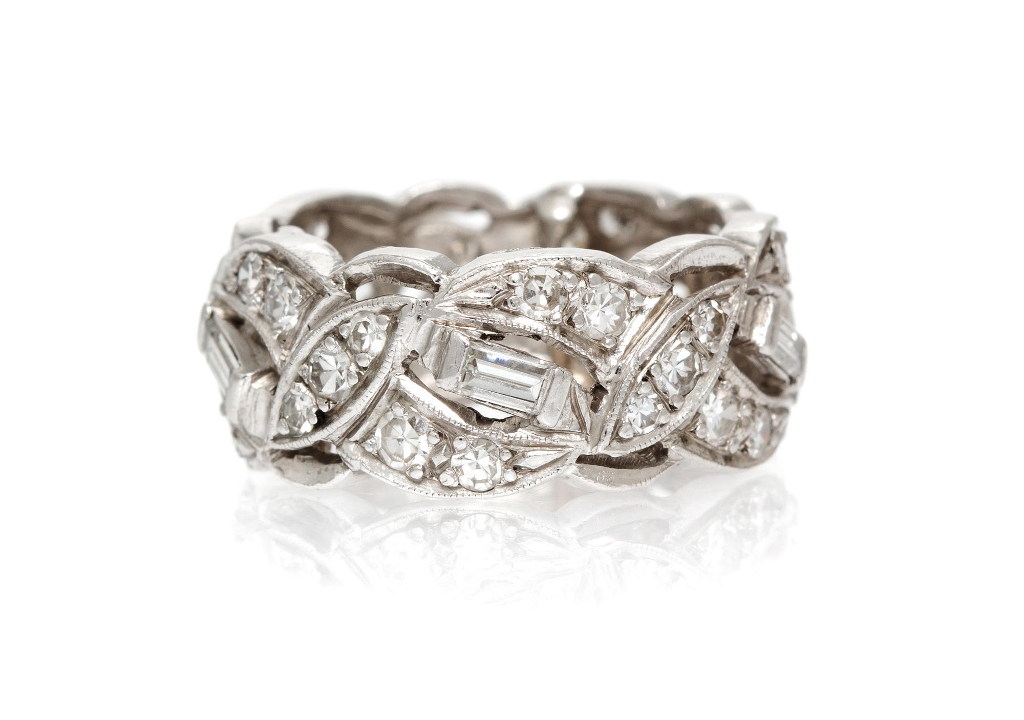 A Platinum and Diamond Eternity Band, 6.40 dwts.