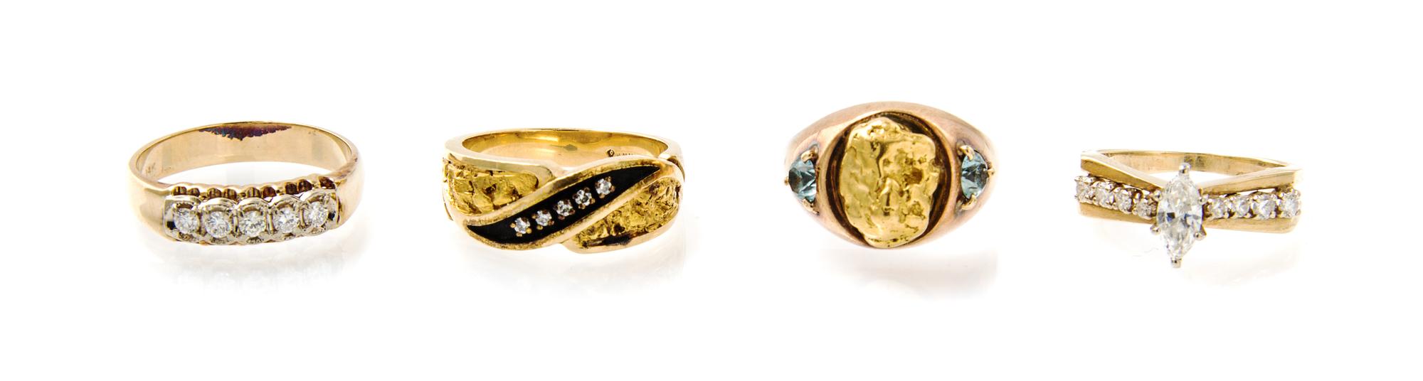 A Collection of 14 Karat Yellow Gold, Diamond and Blue Topaz Rings, 22.60 dwts.
