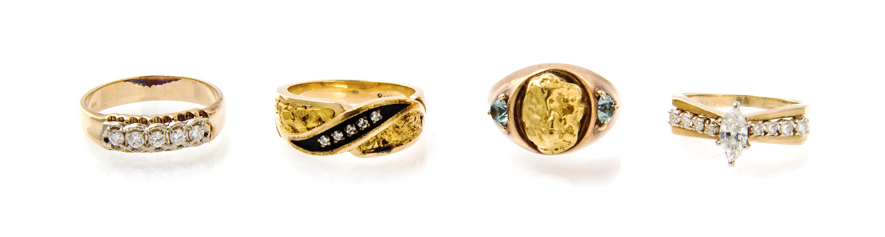 A Collection of 14 Karat Yellow Gold, Diamond and Blue Topaz Rings, 22.60 dwts.