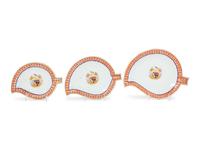 A Set of Three Chinese Export Armorial Porcelain Nesting Plates