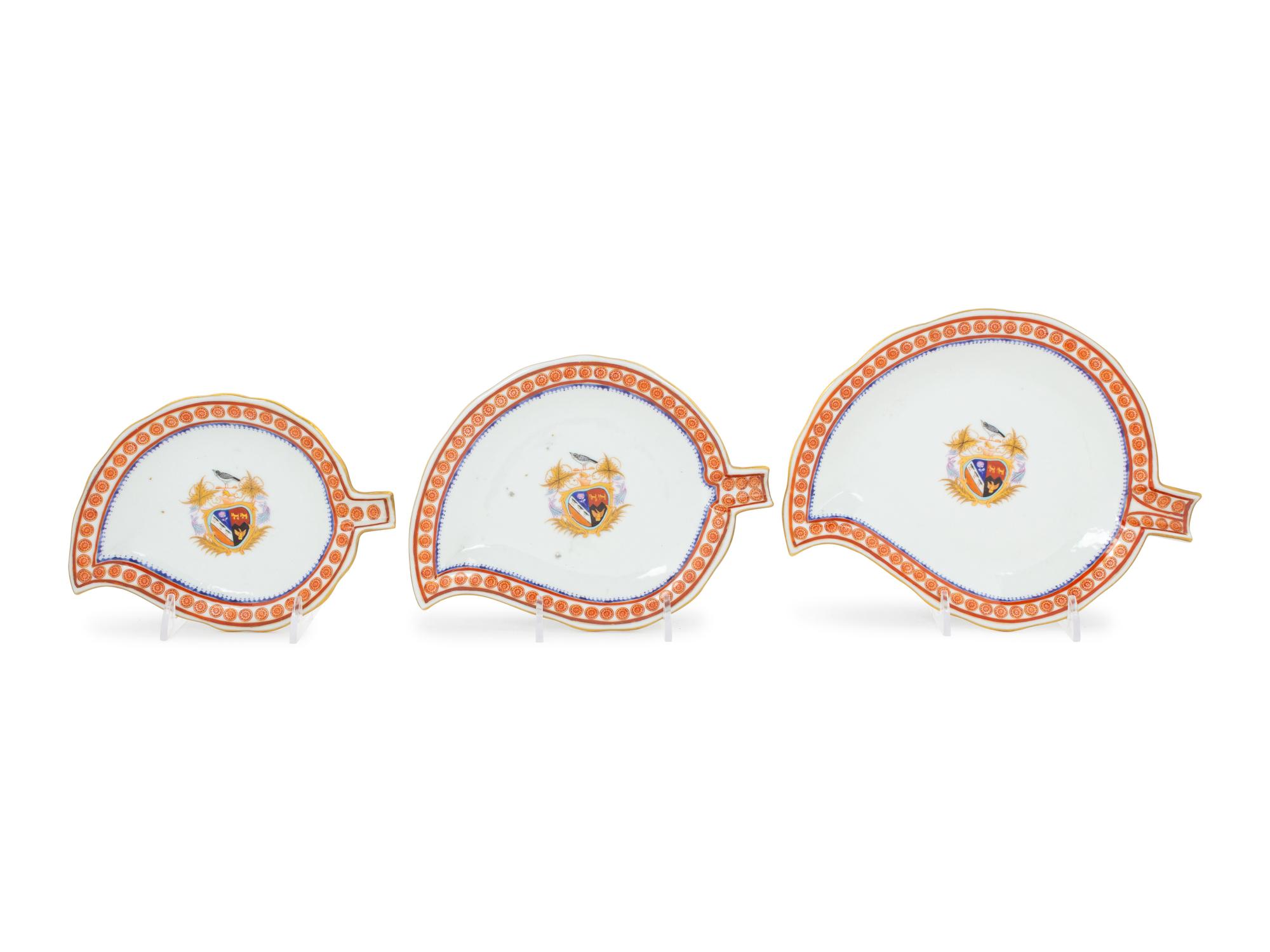 A Set of Three Chinese Export Armorial Porcelain Nesting Plates