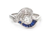 A 14 Karat White Gold, Diamond and Sapphire Ring,