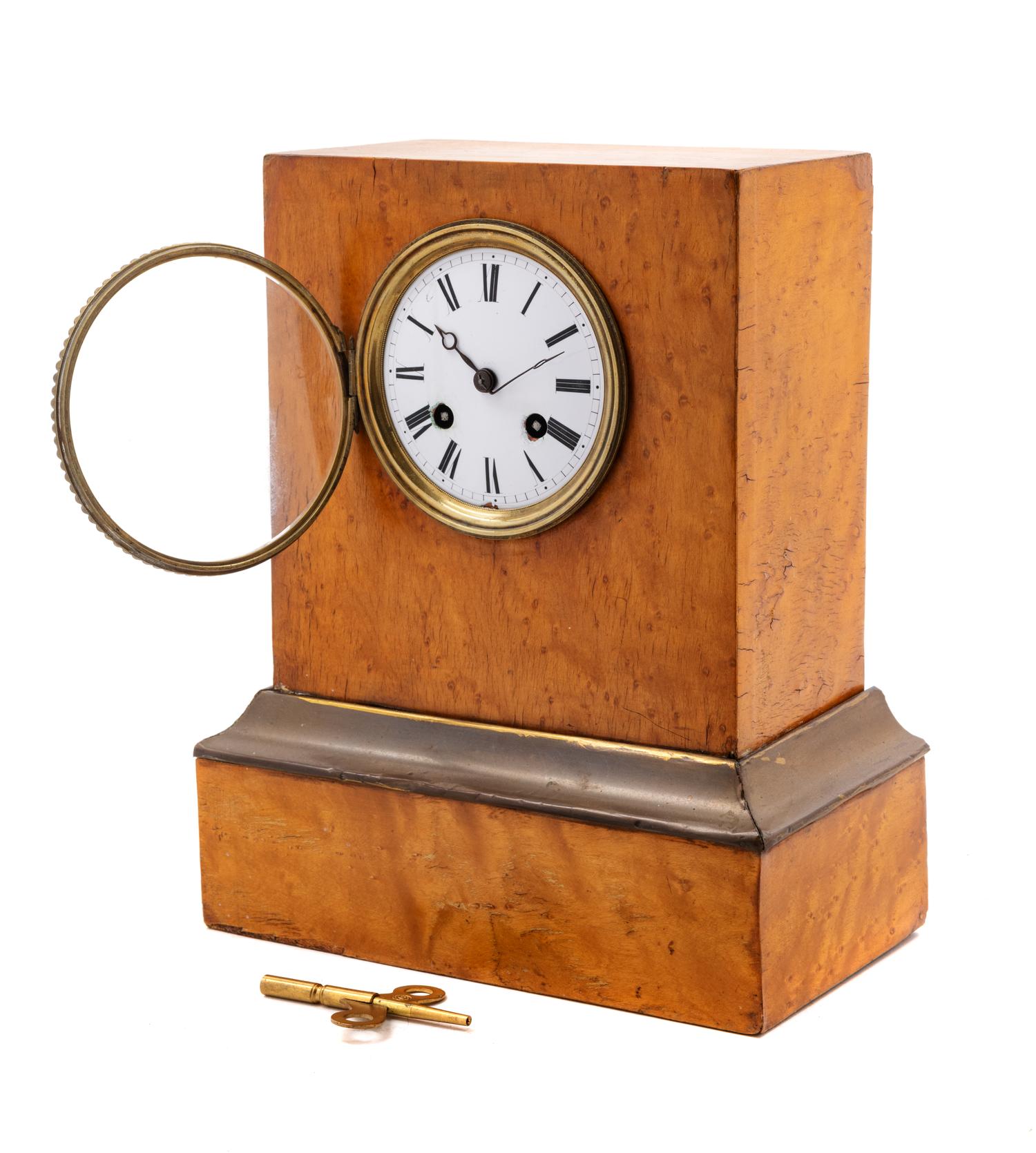 A Continental Maple and Gilt-Metal Mounted Mantel Clock