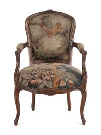 A Louis XV Style Tapestry Upholstered Fruitwood Fauteuil