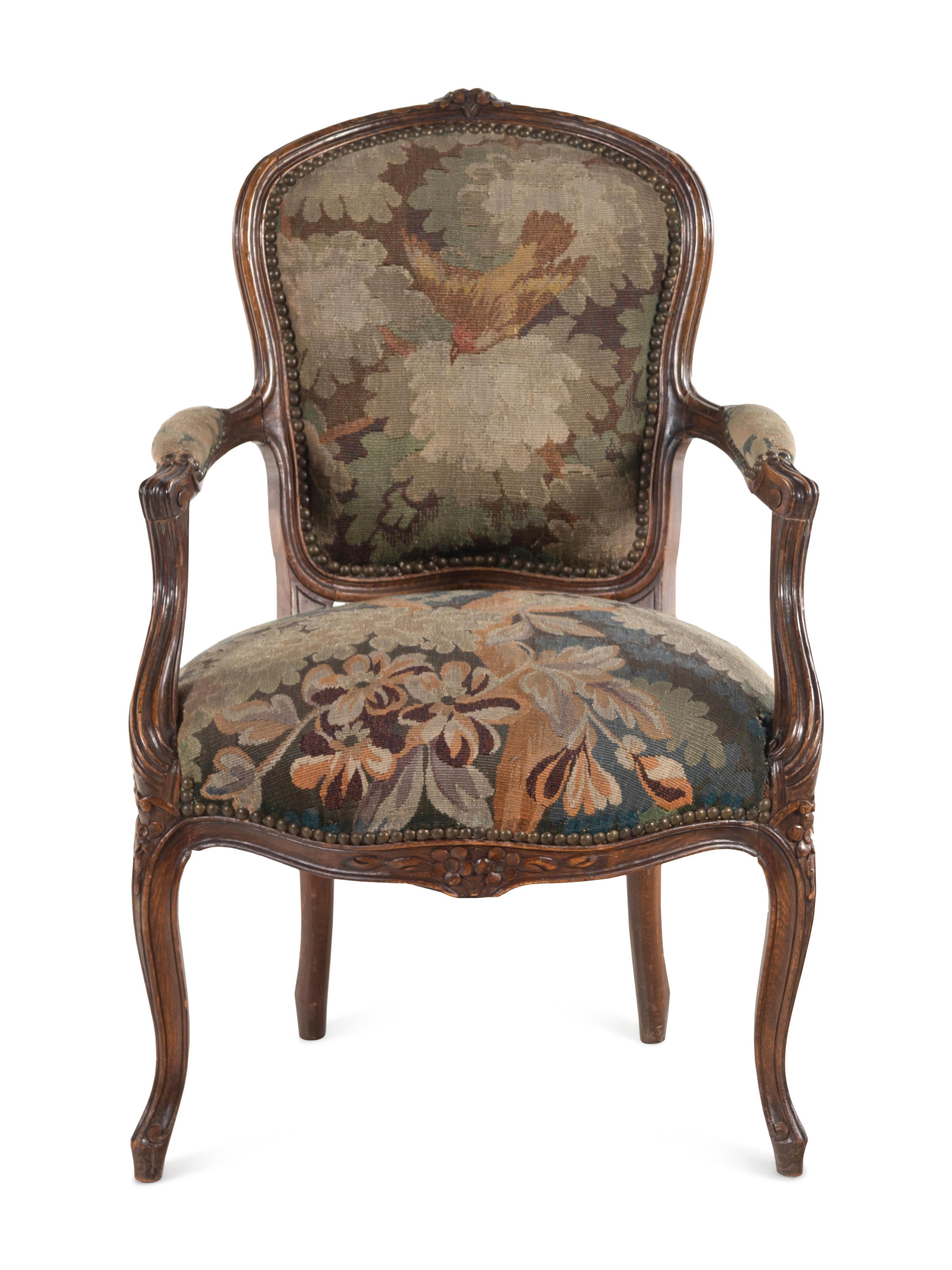 A Louis XV Style Tapestry Upholstered Fruitwood Fauteuil