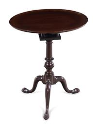 An Irish George III Mahogany Dish-Top Slipper-Foot Candle Stand