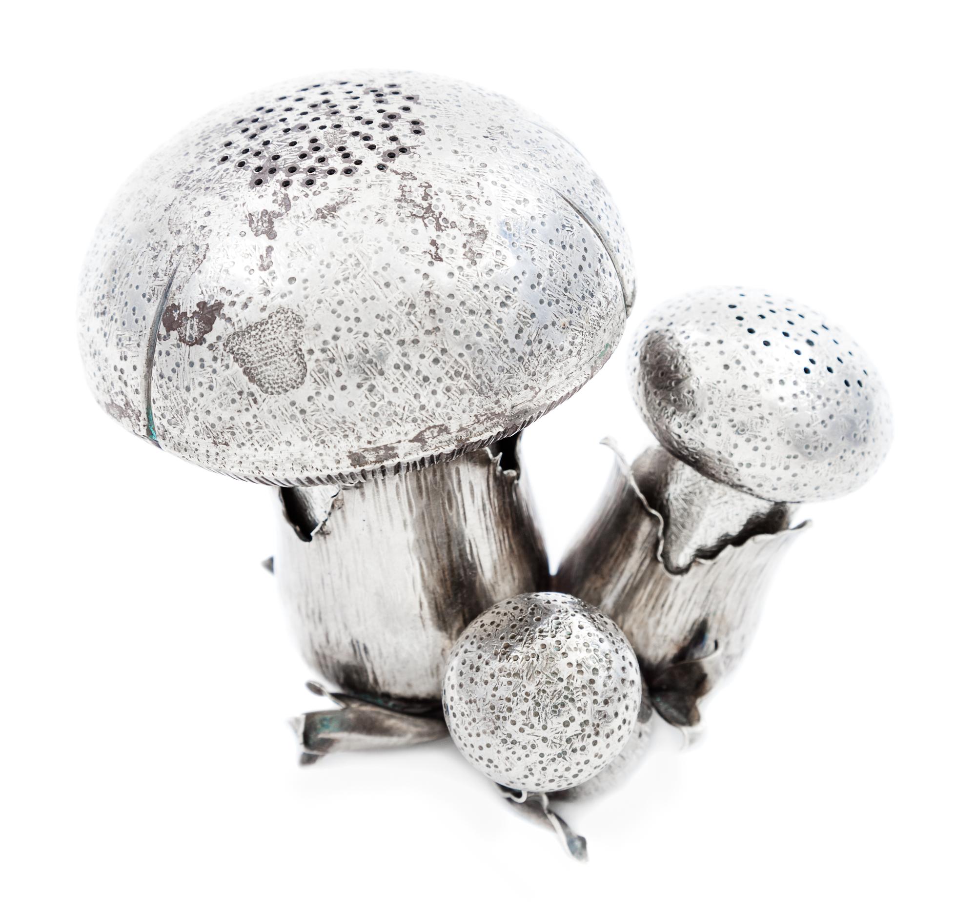 An Italian Silver Salt and Pepper Set, Buccellati, in the form of three mushrooms.