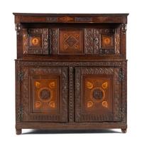 A Jacobean Carved Oak and Marquetry Court Cupboard