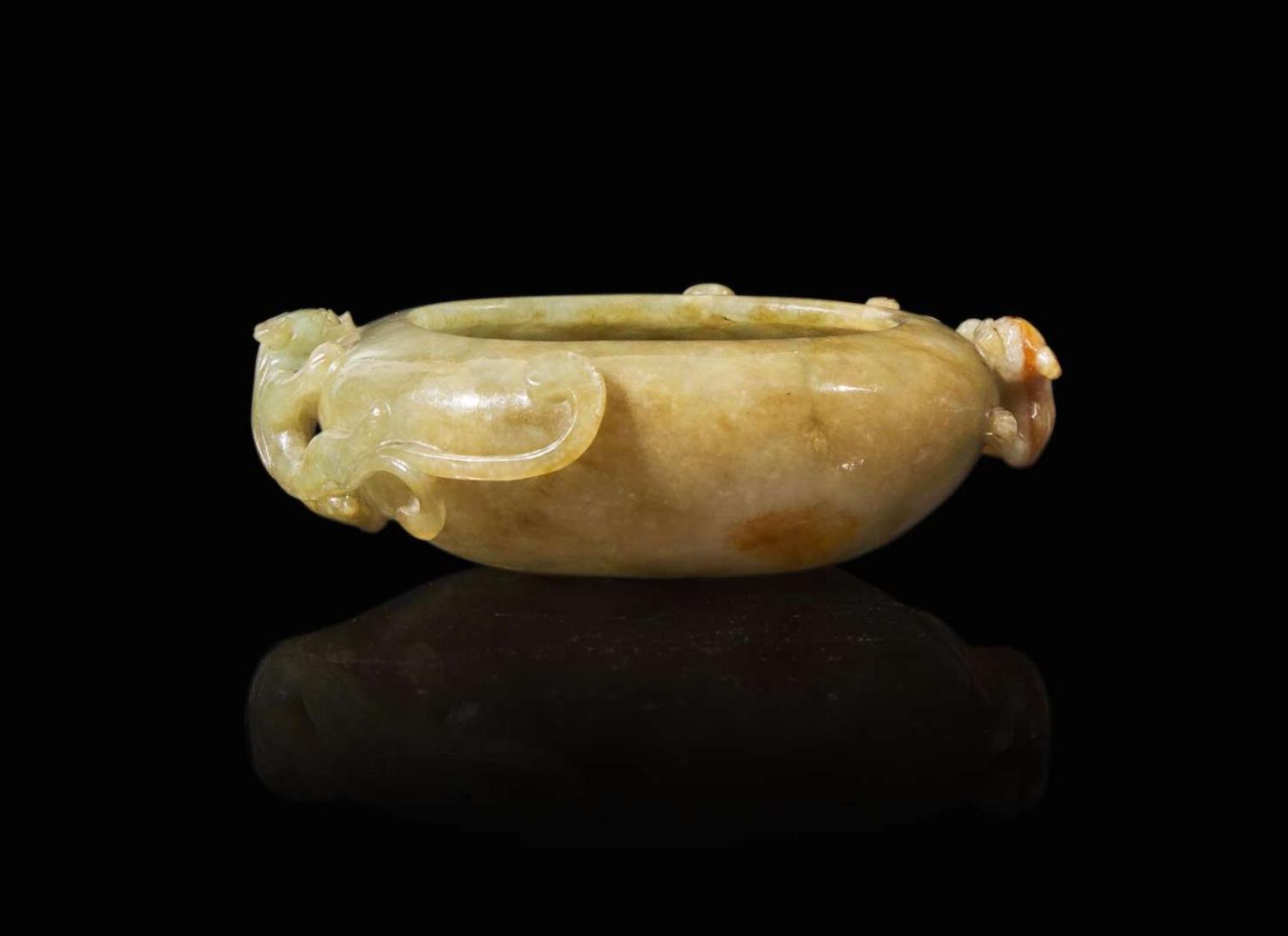 A Chinese carved jadeite "Qilongs" water coupe, Qing dynasty, 19th to early 20h century 翡翠螭龍水洗 清 十九至二十世紀初