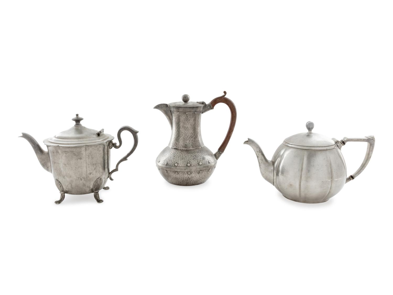 An English Arts & Crafts Hand-Hammered Pewter Teapot