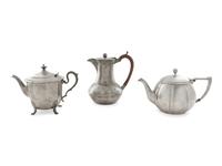 An English Arts & Crafts Hand-Hammered Pewter Teapot