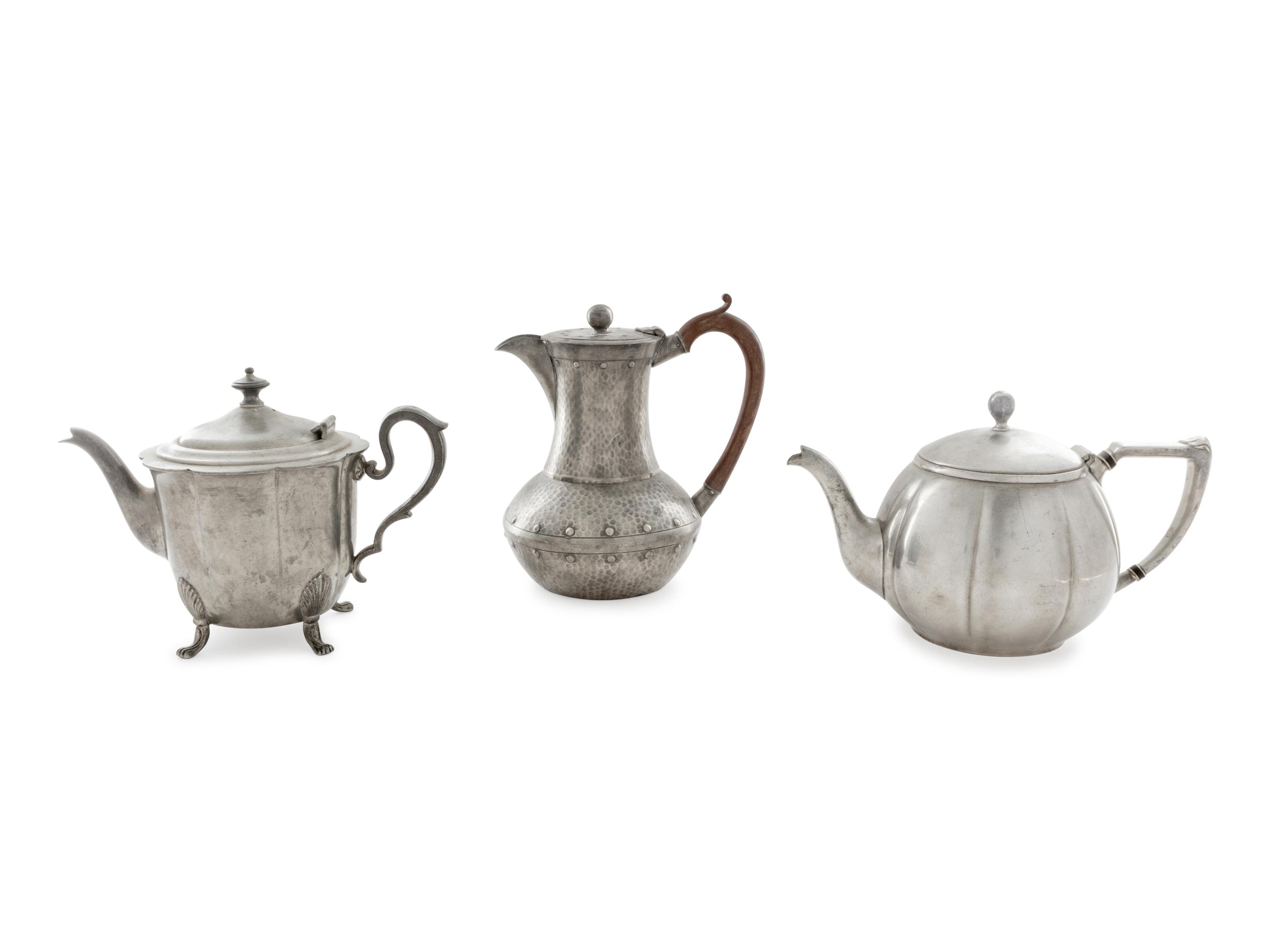 An English Arts & Crafts Hand-Hammered Pewter Teapot