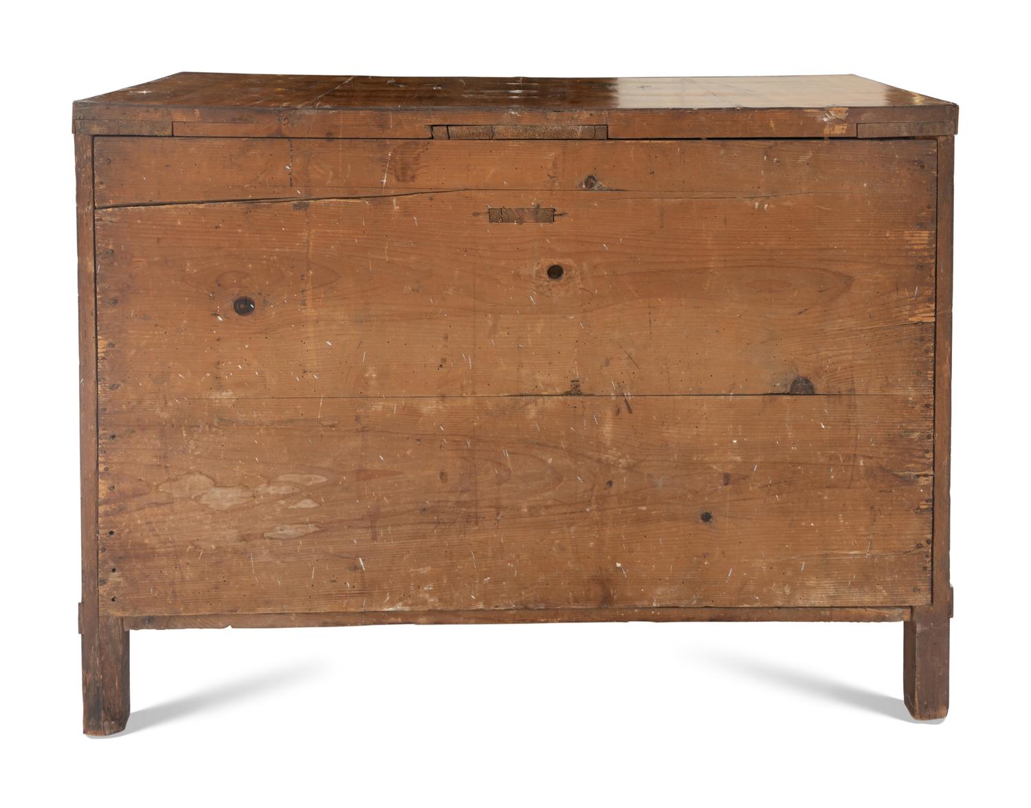 An Empire Walnut and Parcel Ebonized Commode