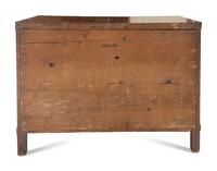 An Empire Walnut and Parcel Ebonized Commode