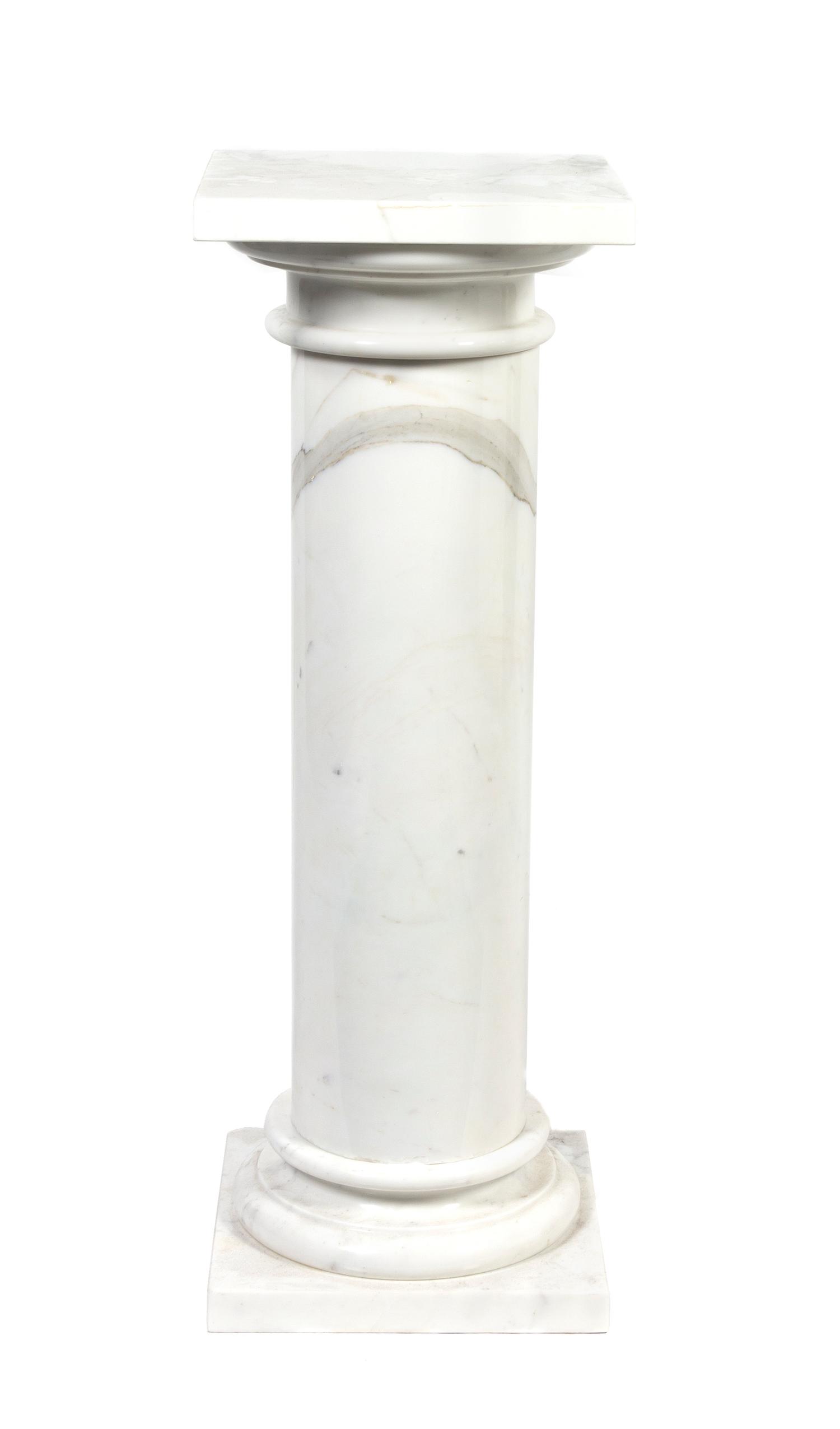 A White Marble Pedestal, Height overall 39 1/2 inches.