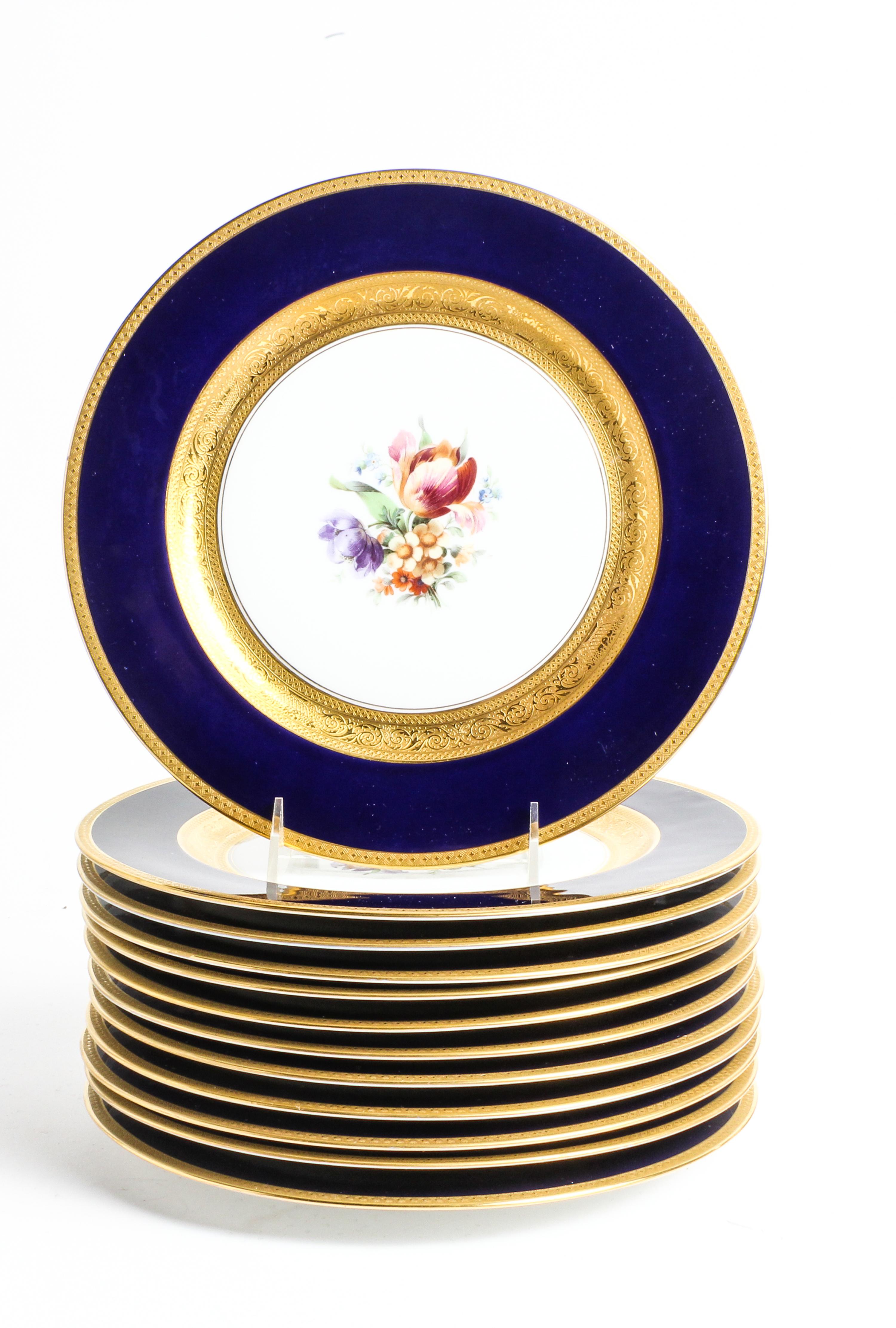 A Set of Twelve Royal Bavarian Painted Porcelain Dinner Plates Diameter 10 1/2 inches.