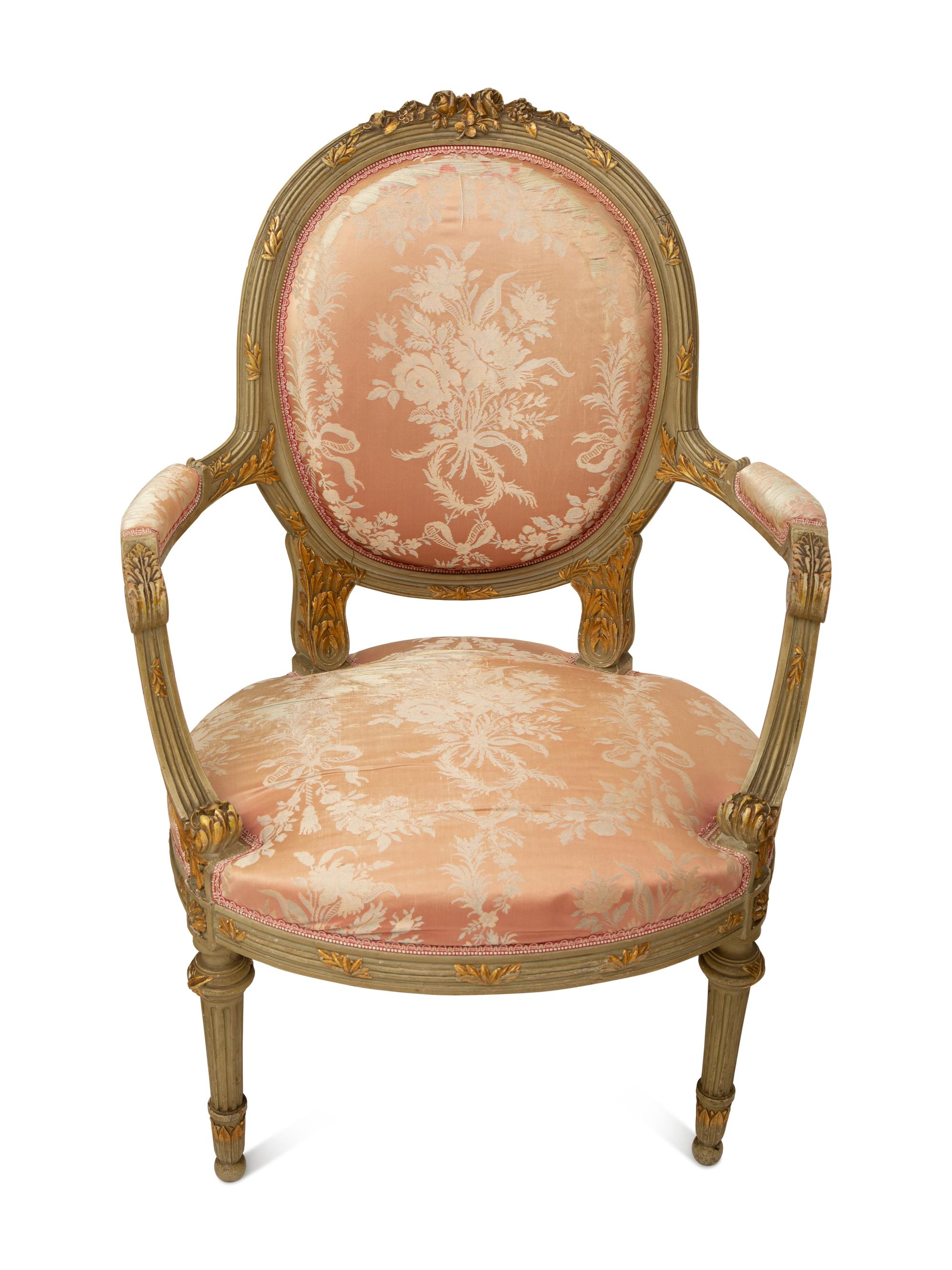 A Louis XVI Style Painted and Parcel Gilt Three-Piece Seating Suite