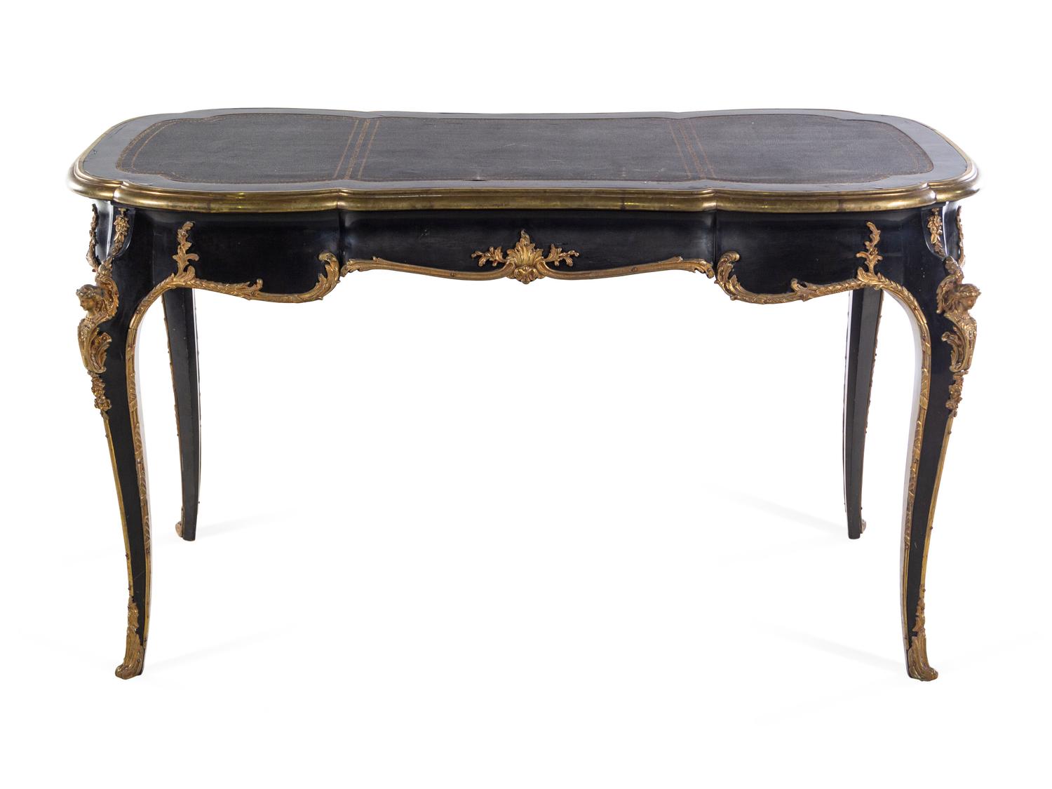 A Louis XV Style Gilt Bronze Mounted Ebonized Bureau Plat