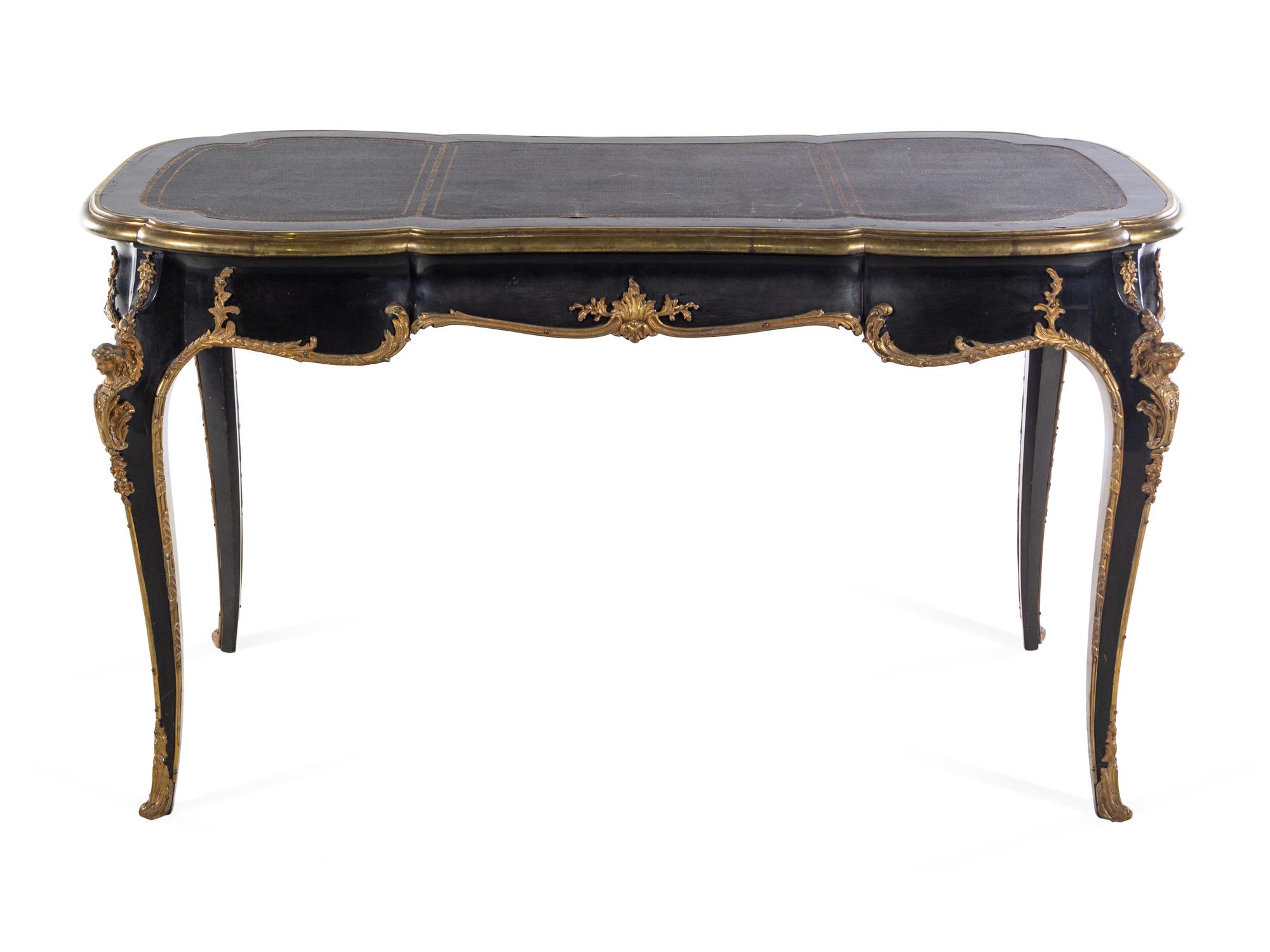 A Louis XV Style Gilt Bronze Mounted Ebonized Bureau Plat
