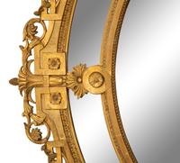 A Napoleon III Giltwood Oval Mirror