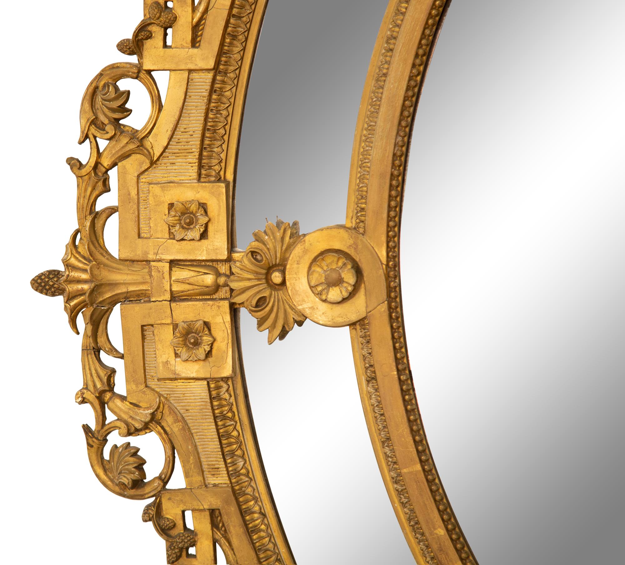 A Napoleon III Giltwood Oval Mirror