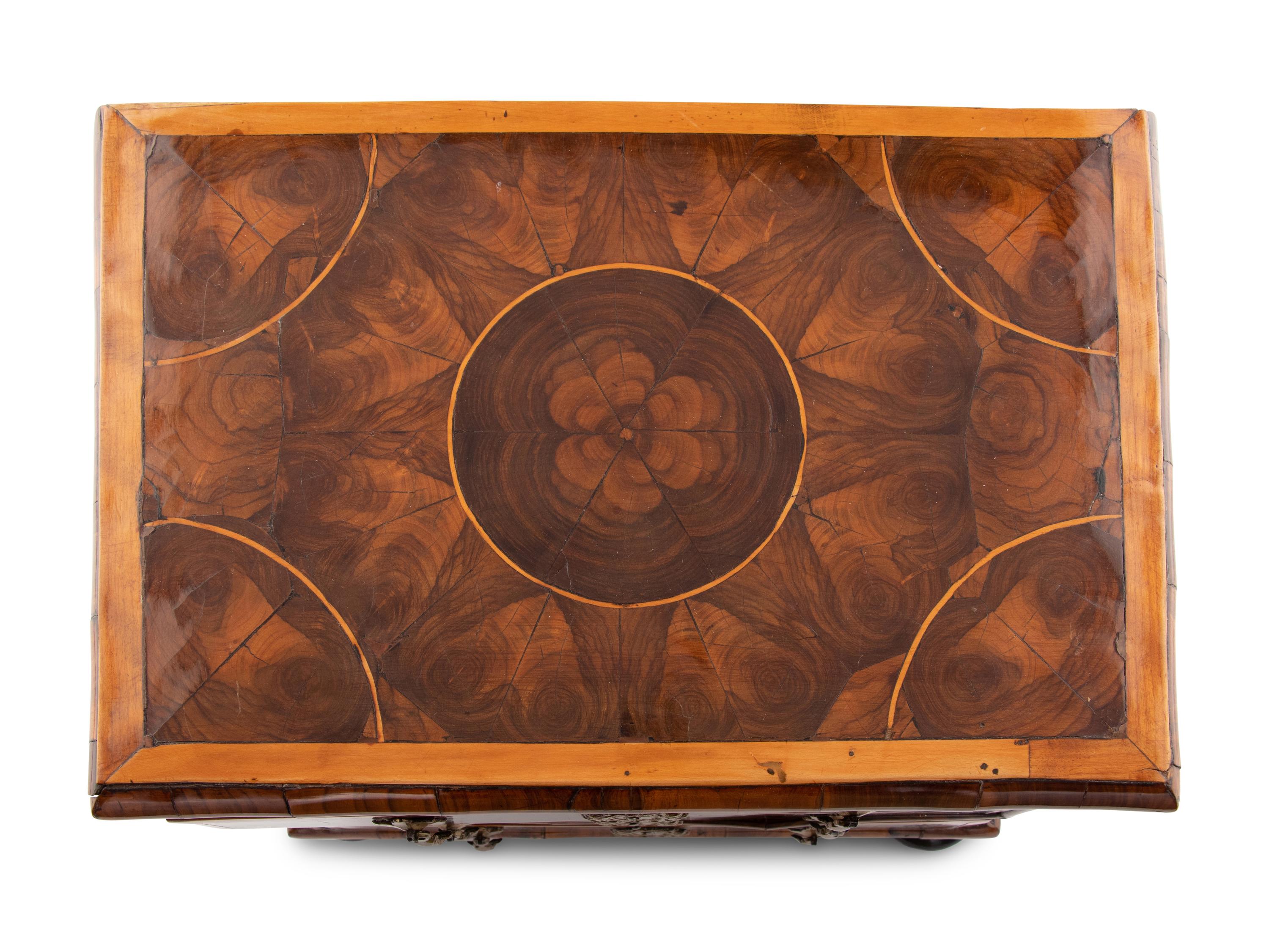 A George I Oysterwood Diminutive Chest of Drawers