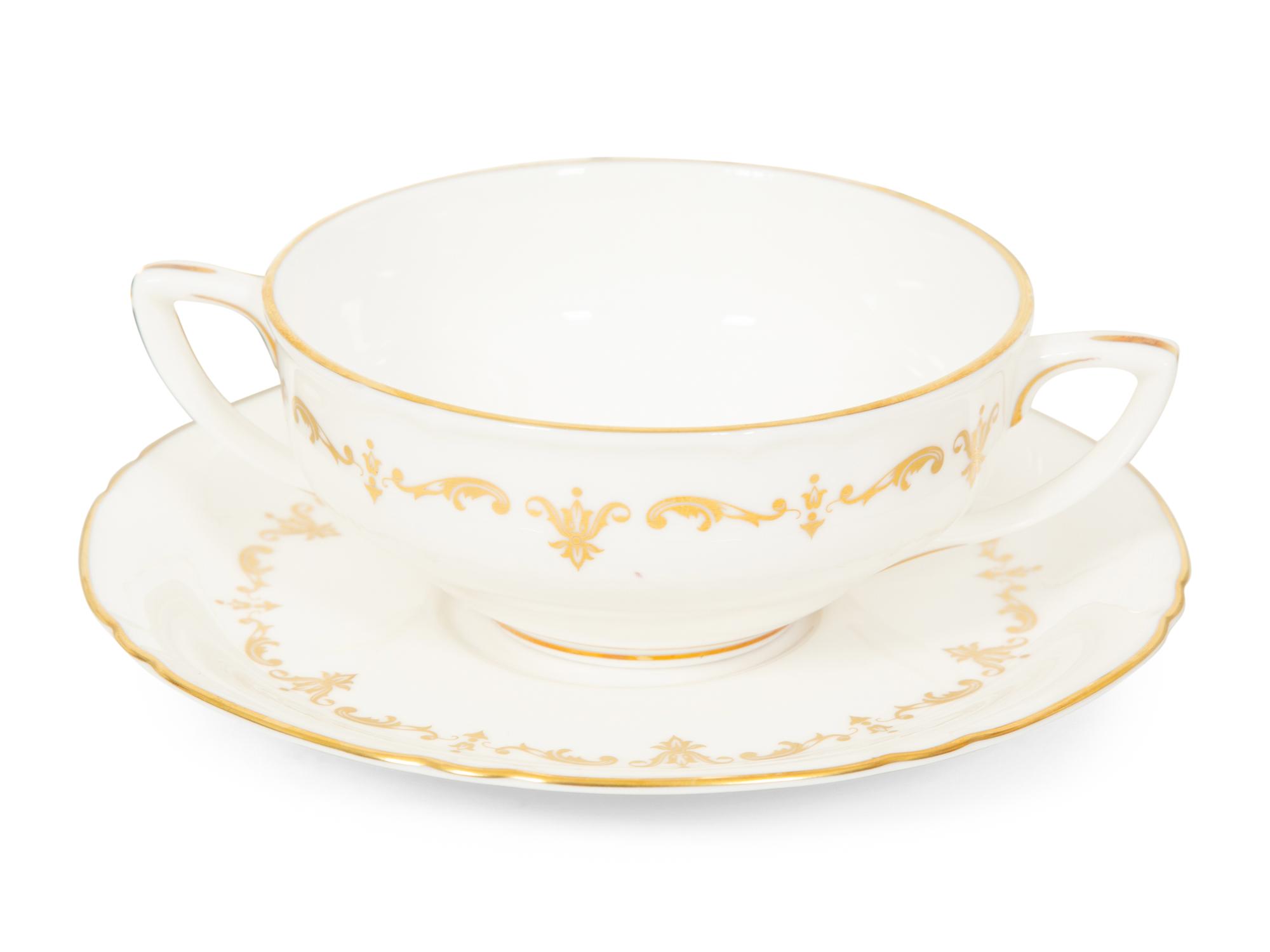 A Royal Worcester Gold Chantilly Porcelain Dinner Service