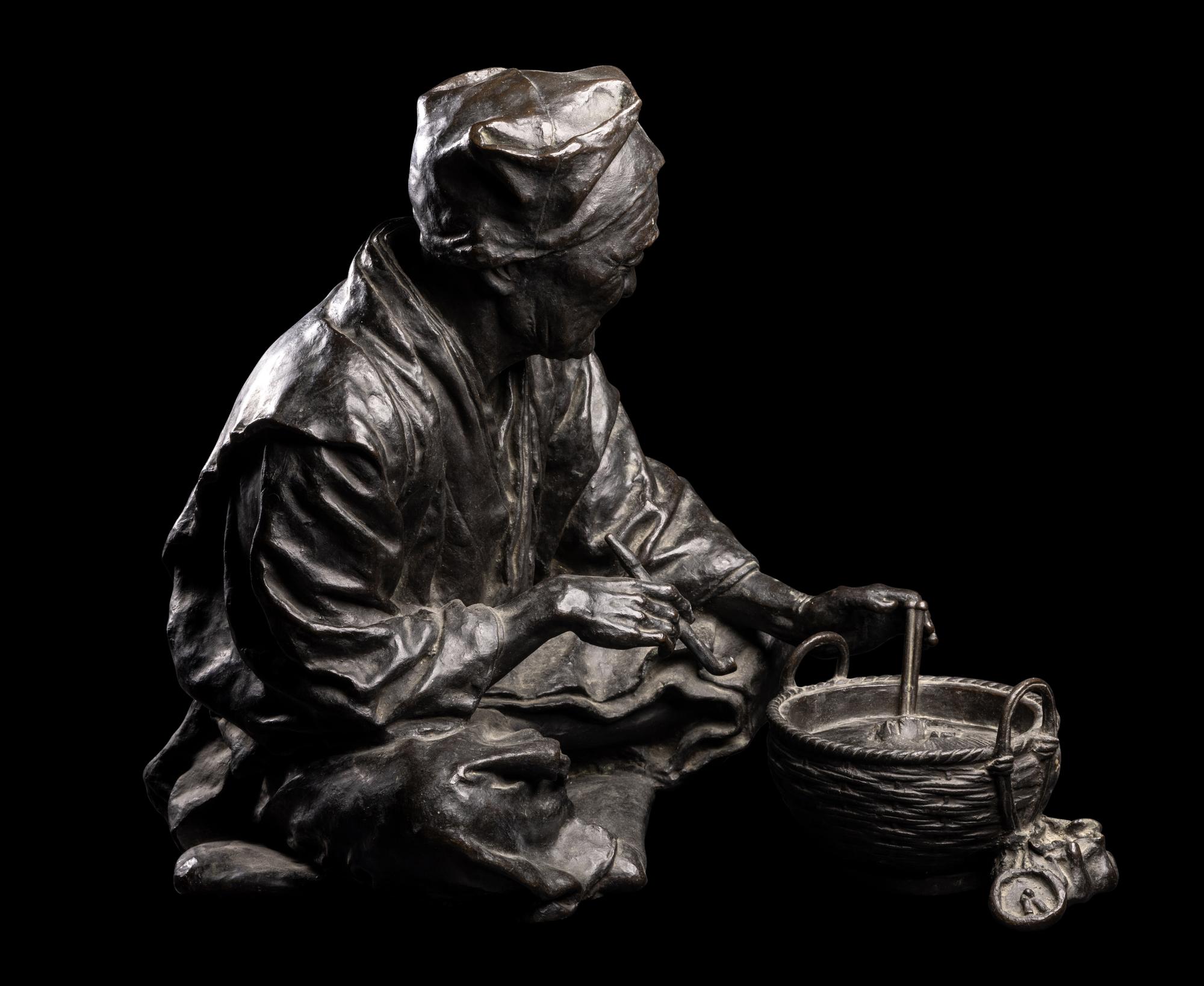 A Japanese Bronze Figure of an Elderly Man