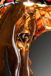 A Cast Bronze and Glass Figural Table Lamp