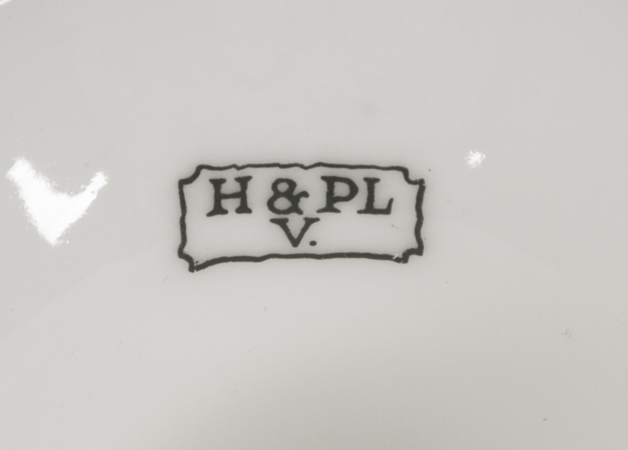 A Limoges Porcelain Table Service