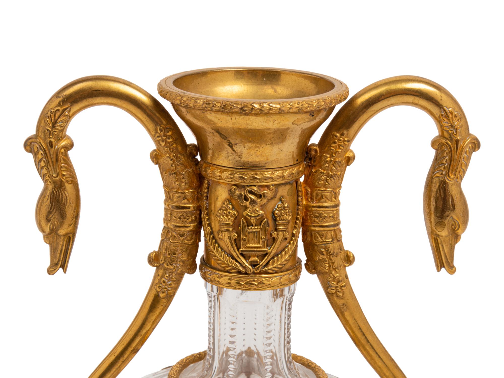A Pair of French Gilt Bronze Mounted Cut Glass Decanters