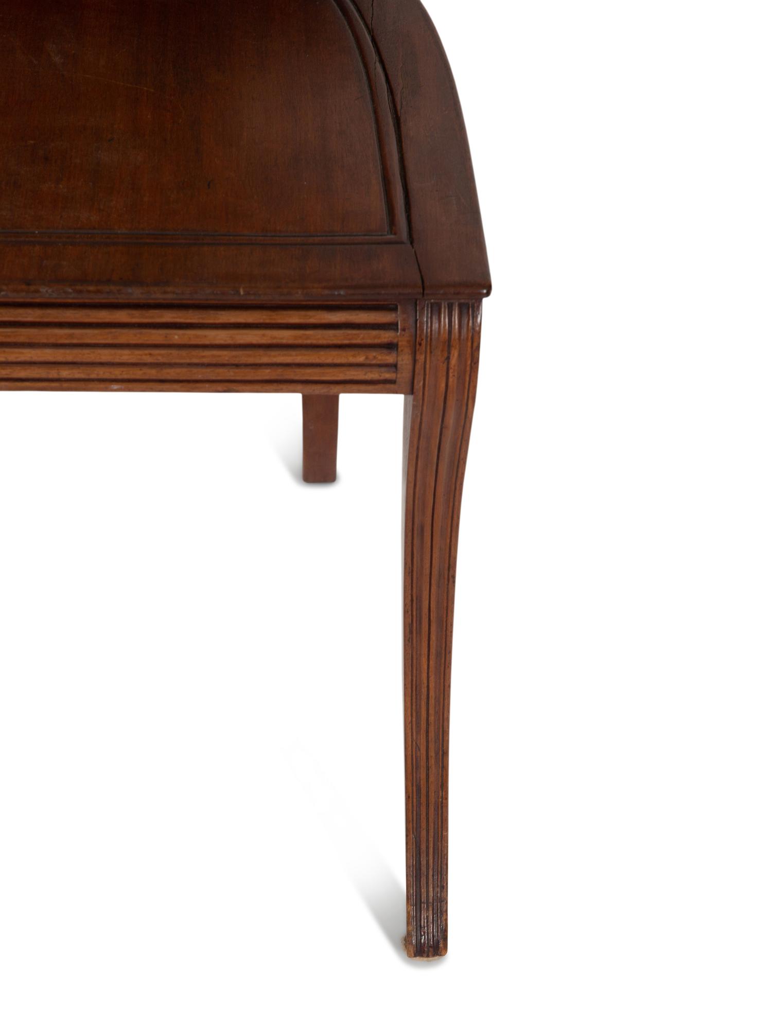 A Pair of French Empire Style Gilt Metal Mounted Mahogany Hall Chairs