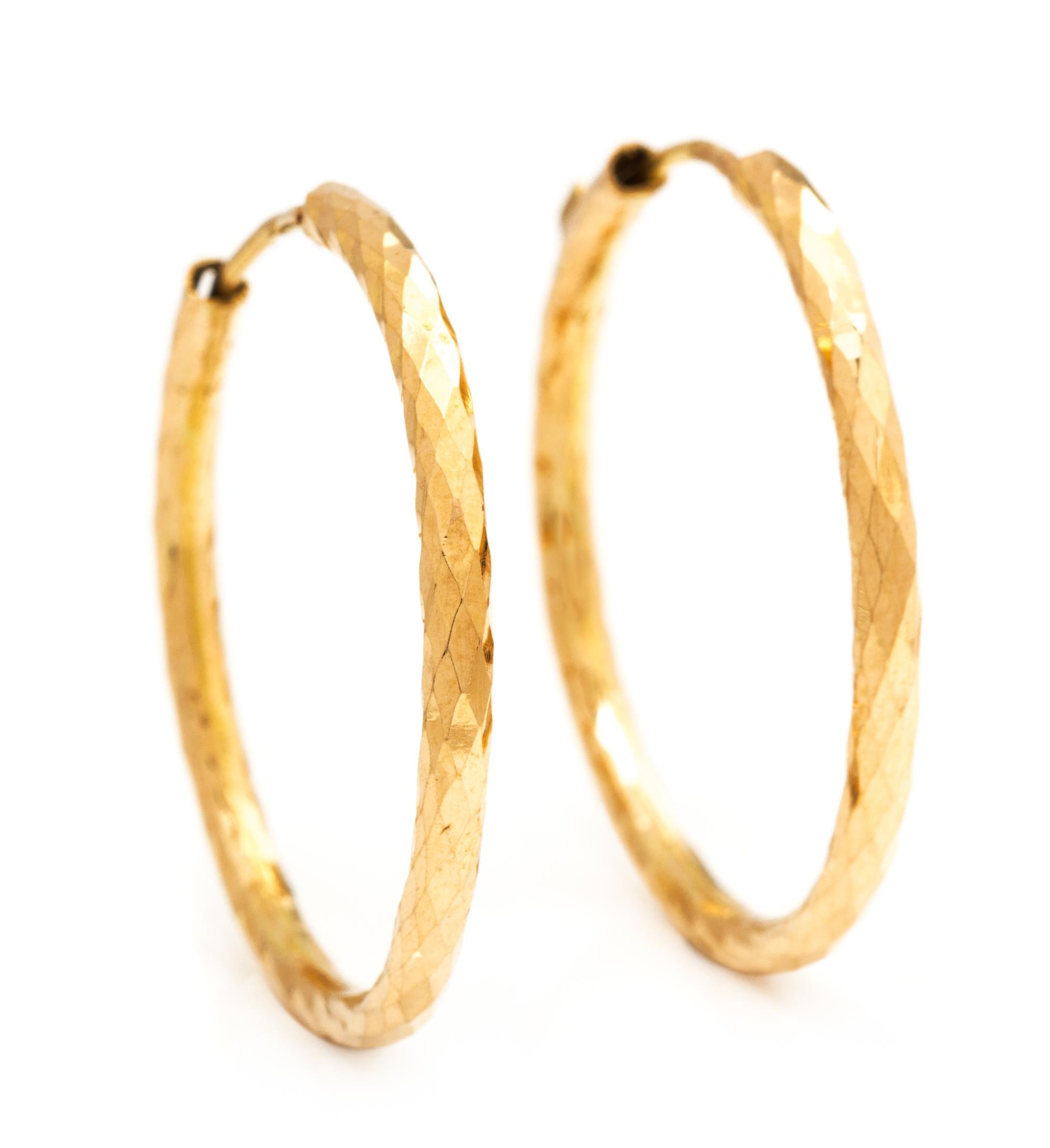 A Pair of Yellow Gold Hoop Earrings. 1.90 dwts.