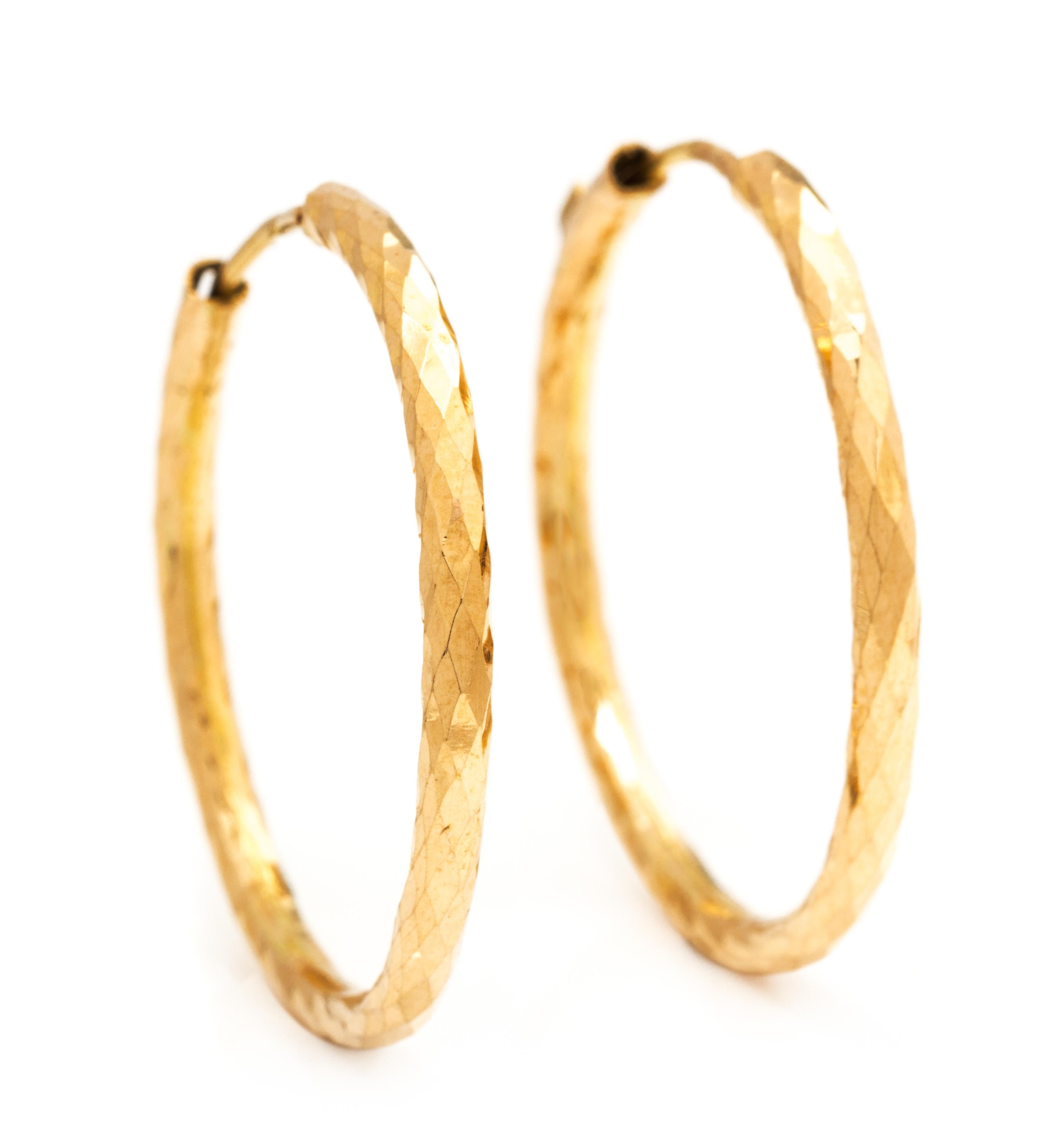 A Pair of Yellow Gold Hoop Earrings. 1.90 dwts.