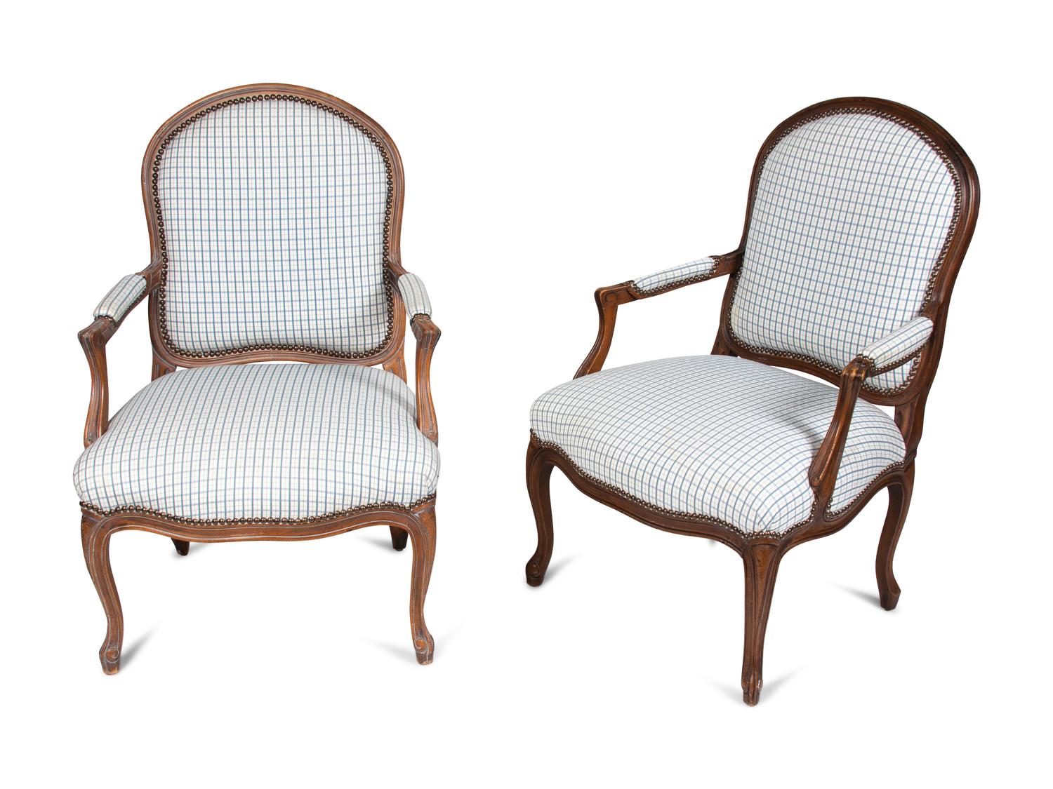 A Pair of Louis XV Style Fauteuils and an Associated Stool