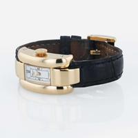 An 18K yellow gold lady's wristwatch, Chopard La Strada Ref . 417404-0001