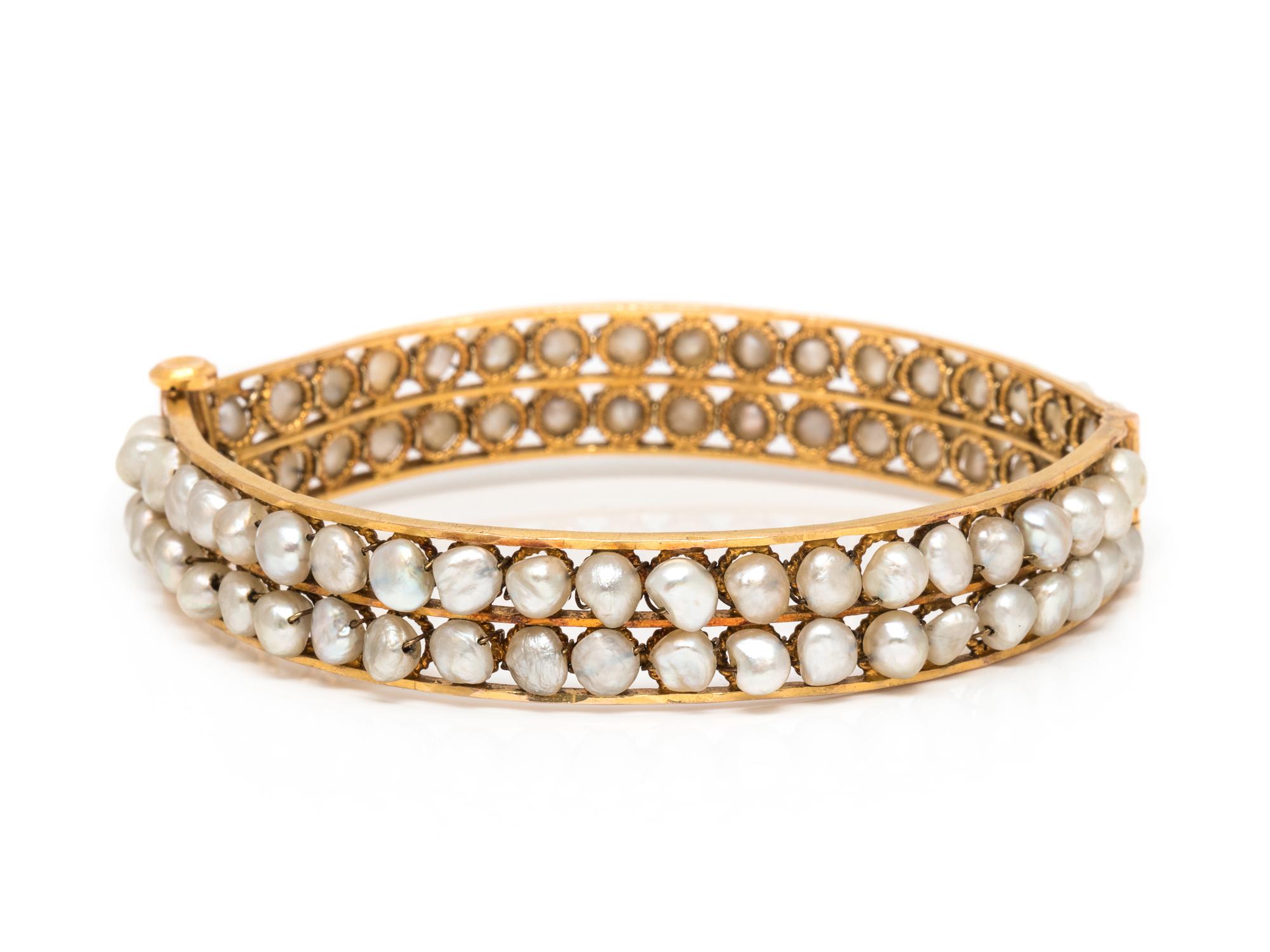A Yellow Gold and Cultured Pearl Bangle Bracelet,