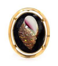 A Reverse Painted Brooch Height 2 inches.